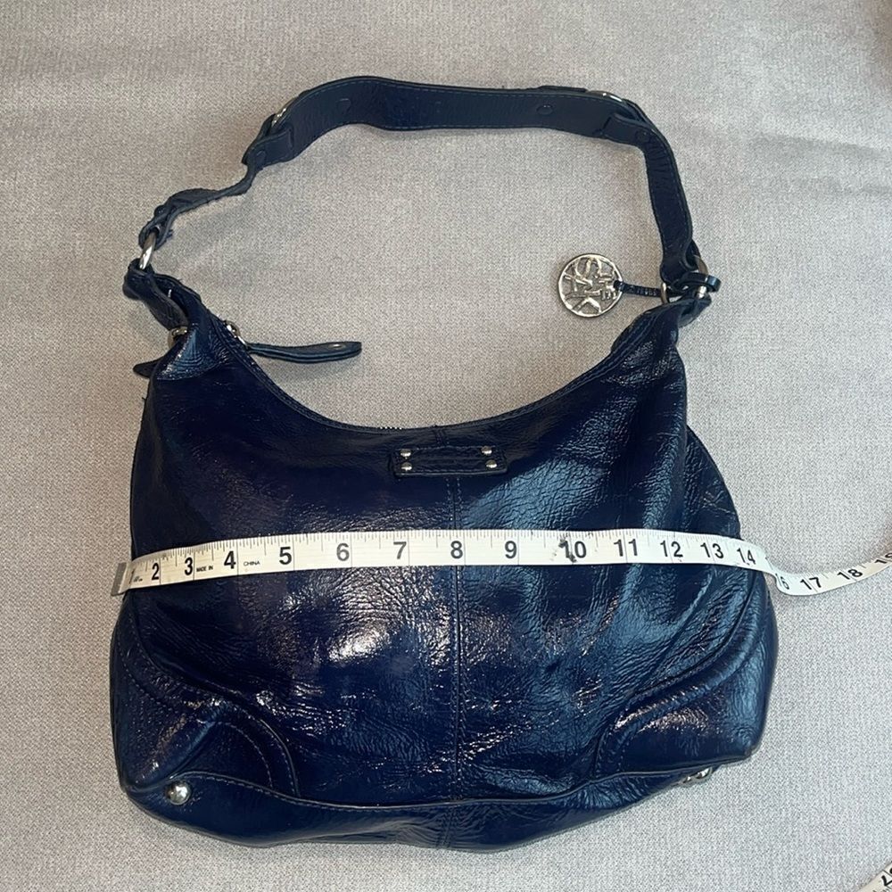The Sak navy blue bag, in excellent condition